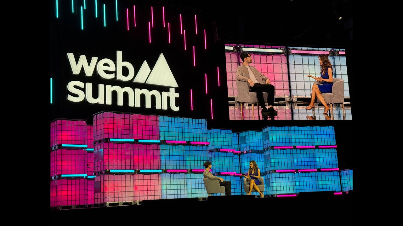 Fireside chat scene: Lightmatter CEO Nick Harris seated on stage at Web Summit 2025.